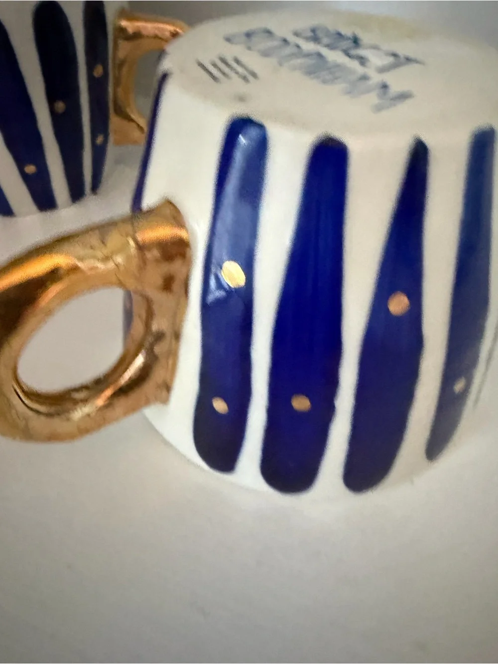 Anthropologie Hand-Painted Navy Stripe Ceramic Cup with Gold Handle